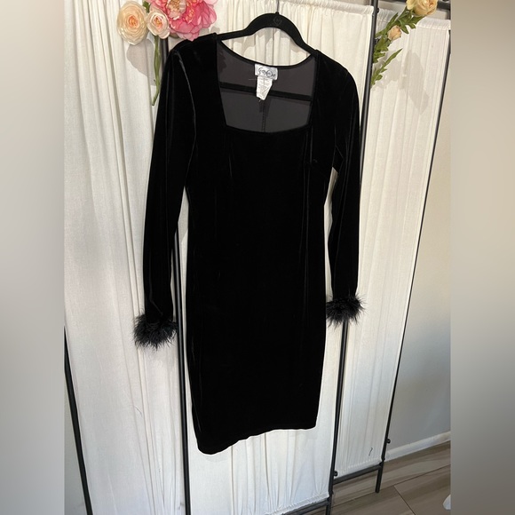 Steppin' Out Dresses & Skirts - Vintage Stepping Out, black velour dress with black feather around the cuff.